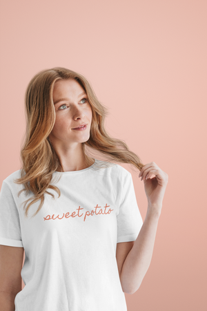 Sweet Potato White tShirt for Thanksgiving with cursive on female influencer model